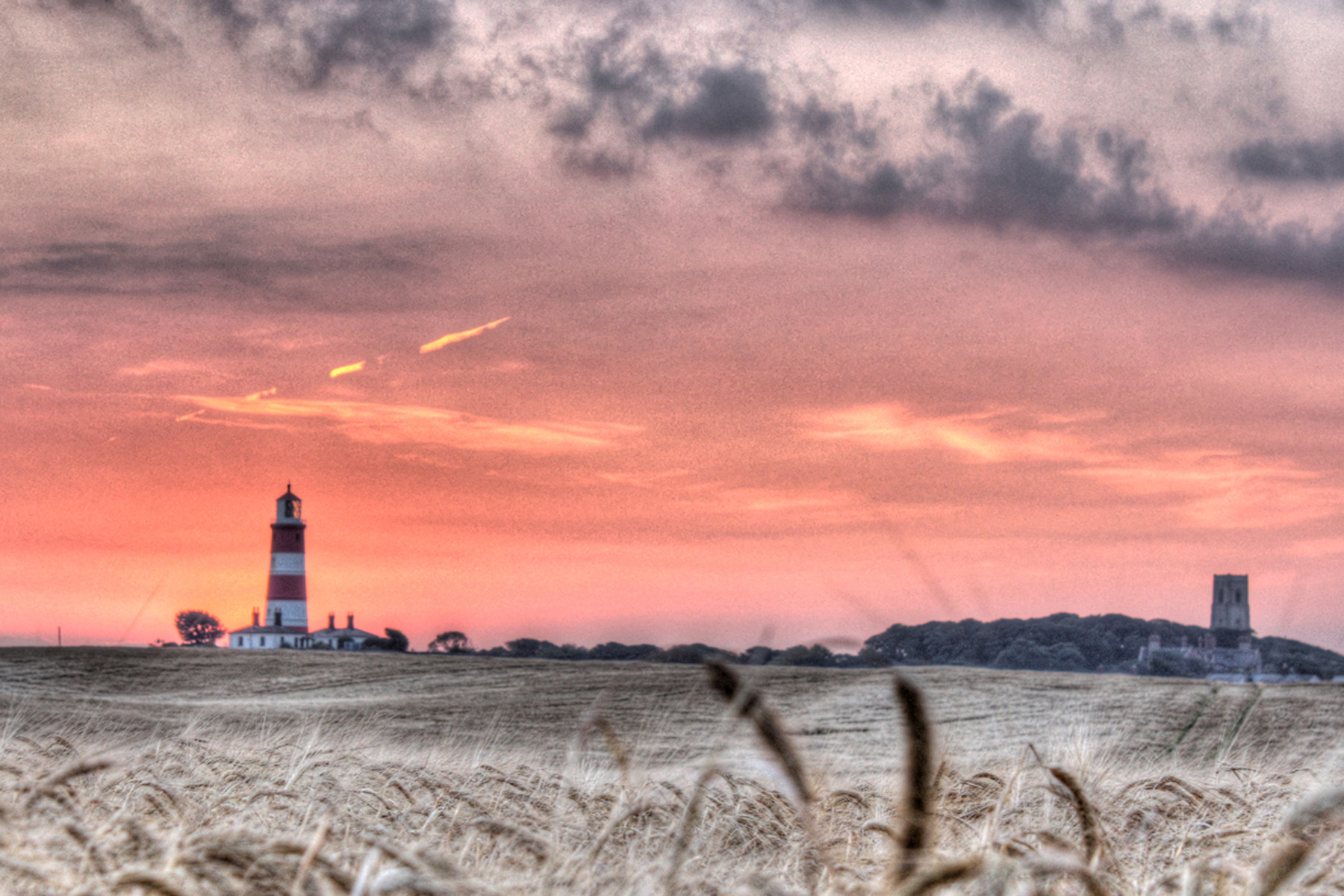 Happisburgh Lighthouse and Church at Sunset